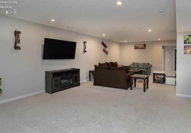 living room with carpet and recessed lighting