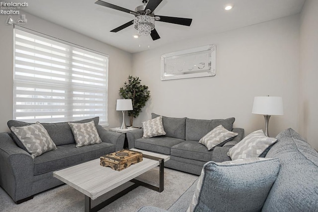 living room featuring recessed lighting and ceiling fan