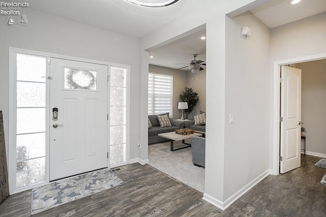 entryway with recessed lighting, baseboards, dark wood-type flooring, and a ceiling fan