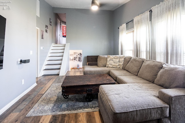 5041 State Route 99, Monroeville, OH 44847 - living area with stairway, baseboards, and dark wood-style flooring