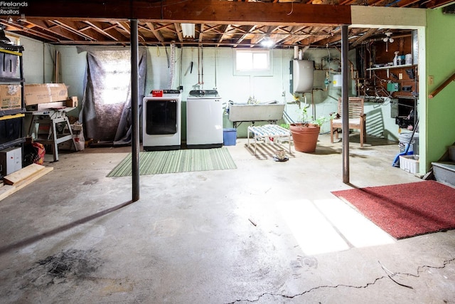 5041 State Route 99, Monroeville, OH 44847 - basement with washer and dryer, water heater, and a sink