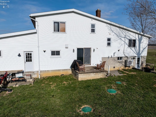 5041 State Route 99, Monroeville, OH 44847 - rear view of property featuring a patio area, a lawn, a chimney, and ac unit