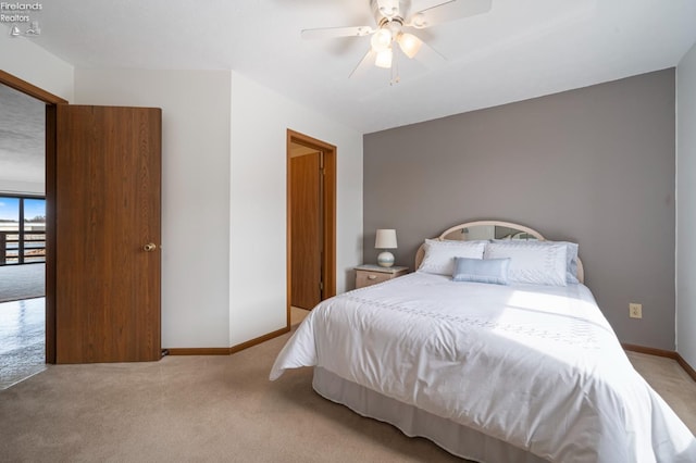 1789 N Windward Dr, Port Clinton, OH 43452 - carpeted bedroom featuring baseboards and ceiling fan