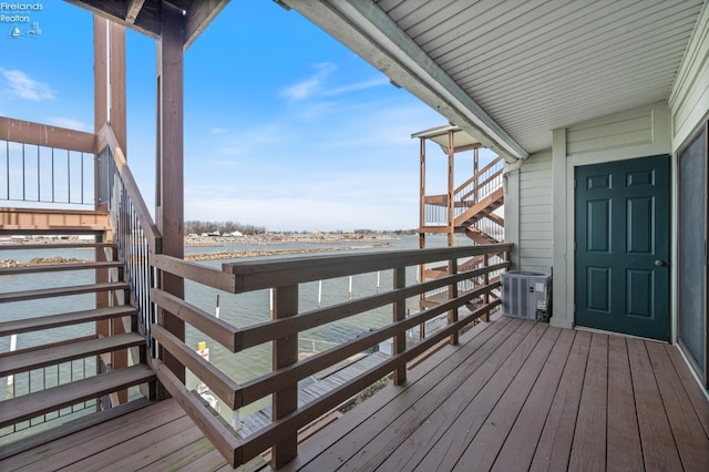 1789 N Windward Dr, Port Clinton, OH 43452 - wooden deck with central air condition unit and a water view