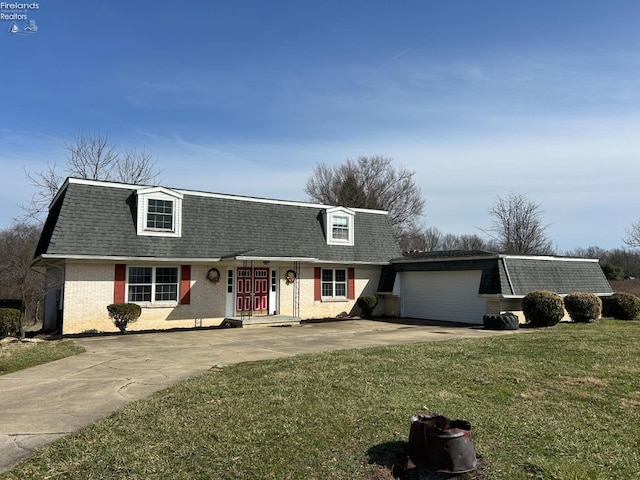 424 N Ridge Rd, Willard, OH 44890 - view of front of property featuring brick siding, a shingled roof, concrete driveway, a front yard, and an attached garage