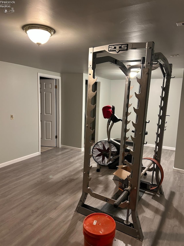 424 N Ridge Rd, Willard, OH 44890 - exercise room featuring wood finished floors and baseboards
