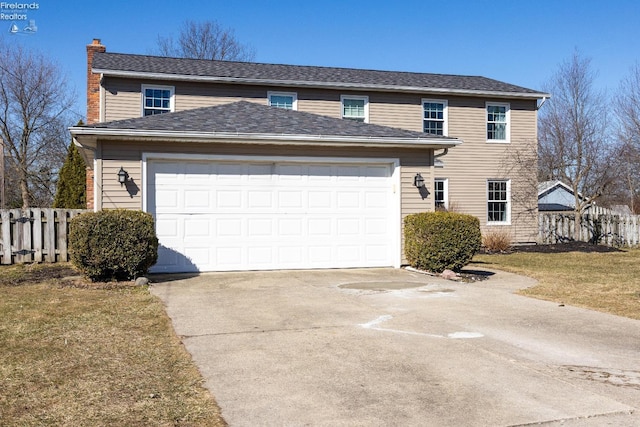 traditional home featuring an attached garage, a chimney, concrete driveway, and fence
