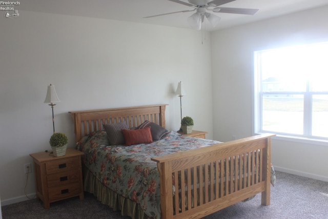 bedroom featuring carpet flooring, baseboards, and ceiling fan