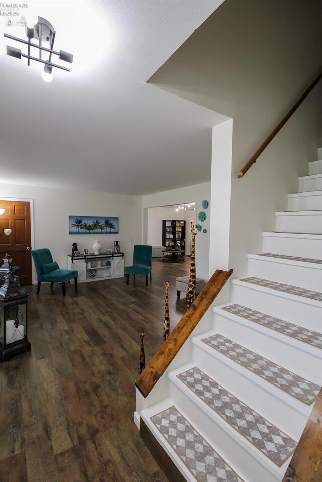 stairs with wood finished floors