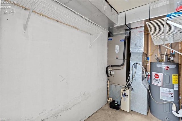utility room featuring electric water heater