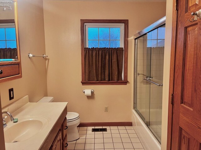 6276 County Road 33, Helena, OH 43435 - full bath with vanity, baseboards, tile patterned flooring, toilet, and visible vents