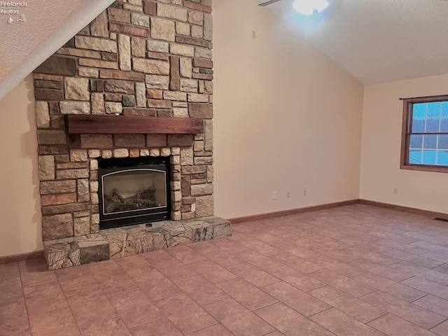 6276 County Road 33, Helena, OH 43435 - unfurnished living room featuring a stone fireplace, a textured ceiling, baseboards, and lofted ceiling