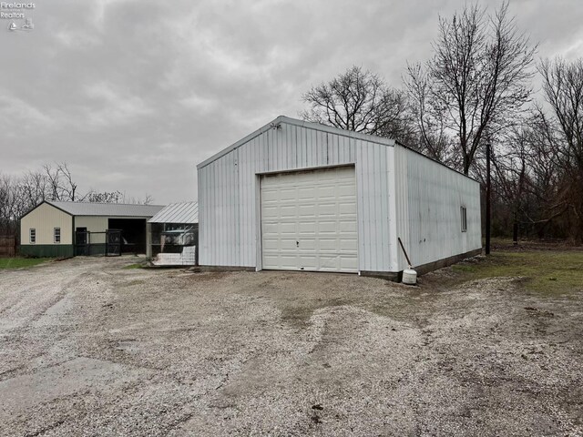 6276 County Road 33, Helena, OH 43435 - detached garage featuring driveway