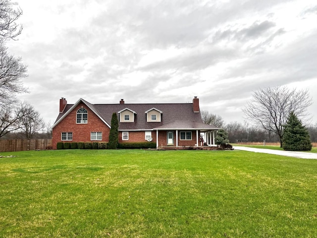 6276 County Road 33, Helena, OH 43435 - view of front of property with a shingled roof, covered porch, a chimney, fence, and a front lawn