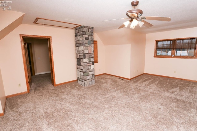 6276 County Road 33, Helena, OH 43435 - spare room featuring baseboards, carpet flooring, attic access, a ceiling fan, and lofted ceiling