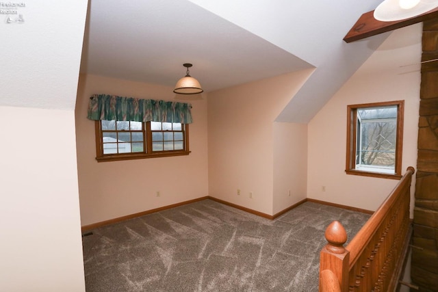 6276 County Road 33, Helena, OH 43435 - additional living space featuring baseboards, vaulted ceiling, and carpet floors