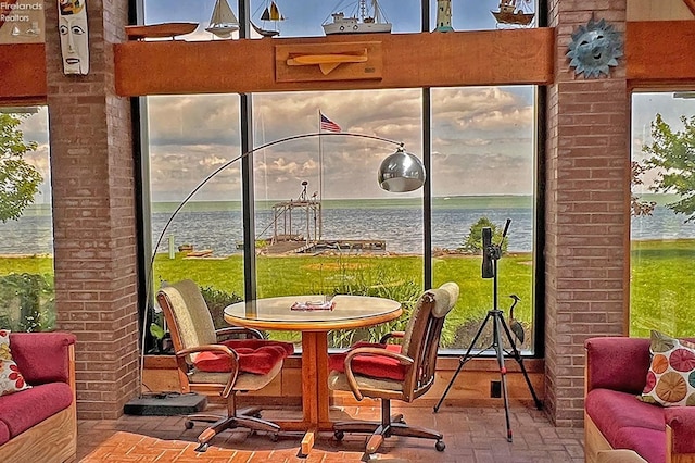 208 Johanna Ln, Kelleys Island, OH 43438 - sunroom / solarium featuring a water view