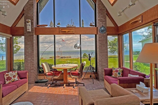208 Johanna Ln, Kelleys Island, OH 43438 - sunroom with brick floor and high vaulted ceiling