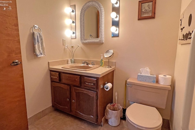 208 Johanna Ln, Kelleys Island, OH 43438 - bathroom with tile patterned floors, toilet, and vanity