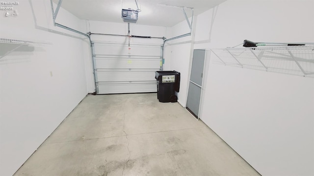 100 Grand Ave, Clyde, OH 43410 - garage with a garage door opener