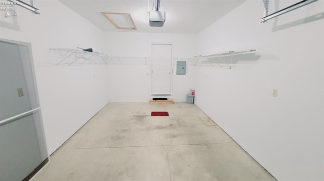 100 Grand Ave, Clyde, OH 43410 - garage featuring a garage door opener and electric panel