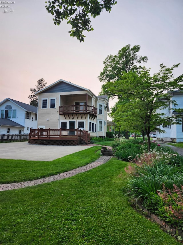 191 W Main St, Norwalk, OH 44857 - back of house featuring a balcony and a wooden deck
