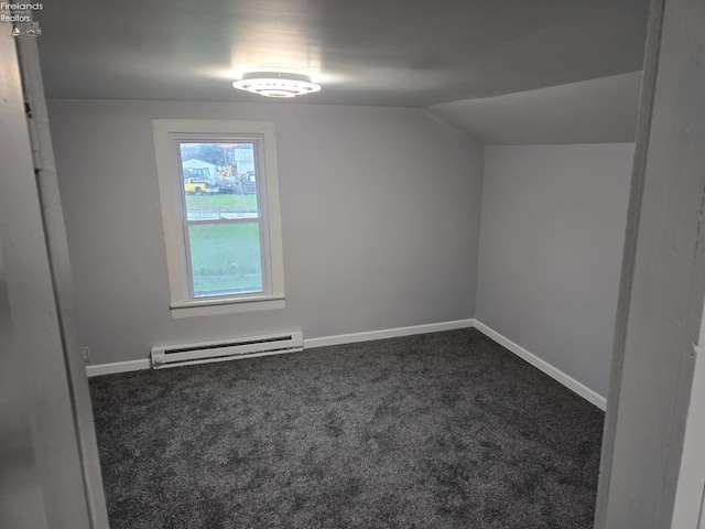 bonus room with dark carpet, a baseboard radiator, baseboards, and vaulted ceiling