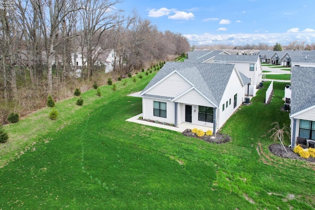 drone / aerial view with a residential view