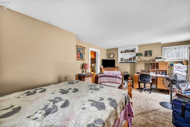 bedroom featuring carpet