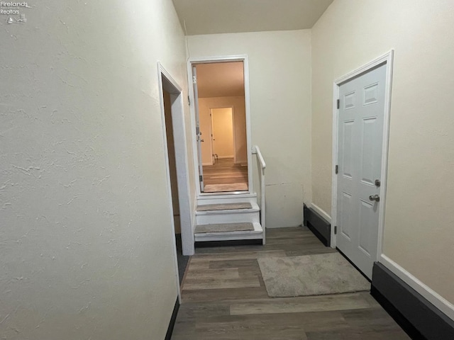 hallway with wood finished floors