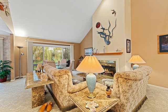 526 Mariner Vlg, Huron, OH 44839 - carpeted living area with high vaulted ceiling, baseboards, and a glass covered fireplace