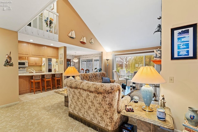 526 Mariner Vlg, Huron, OH 44839 - living area with high vaulted ceiling and baseboards