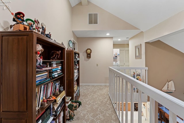 526 Mariner Vlg, Huron, OH 44839 - hallway with high vaulted ceiling, visible vents, light carpet, an upstairs landing, and baseboards