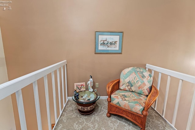 526 Mariner Vlg, Huron, OH 44839 - living area with baseboards and an upstairs landing