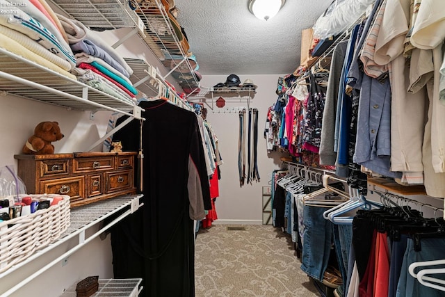 526 Mariner Vlg, Huron, OH 44839 - walk in closet featuring light carpet
