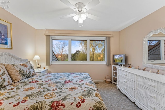 526 Mariner Vlg, Huron, OH 44839 - bedroom featuring carpet, multiple windows, baseboards, and a ceiling fan
