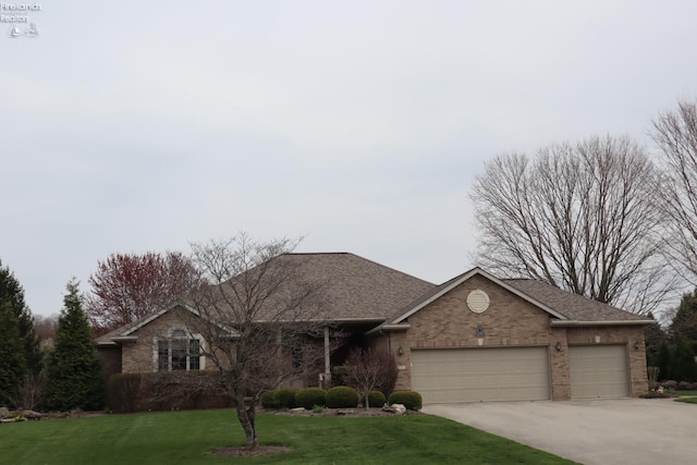 79 Ridgeview Cir, Milan, OH 44846 - single story home featuring brick siding, driveway, a front lawn, and an attached garage