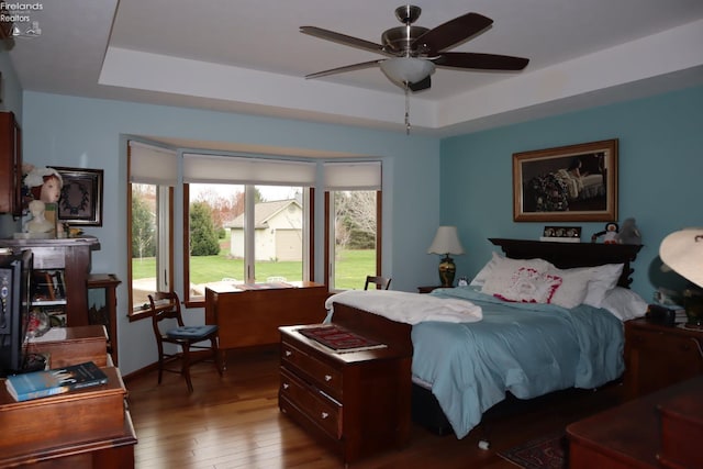 79 Ridgeview Cir, Milan, OH 44846 - bedroom featuring hardwood / wood-style flooring and a raised ceiling