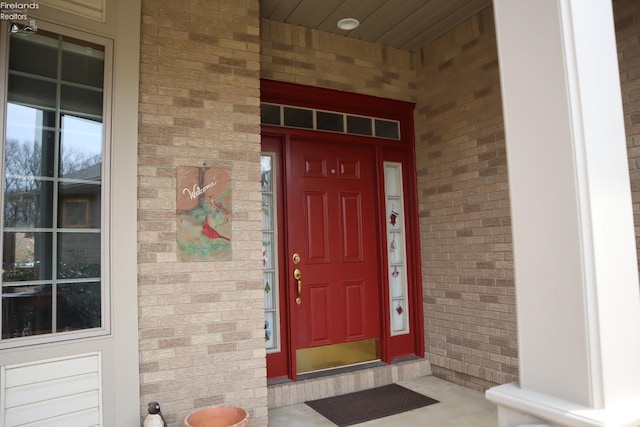 79 Ridgeview Cir, Milan, OH 44846 - property entrance featuring brick siding and covered porch