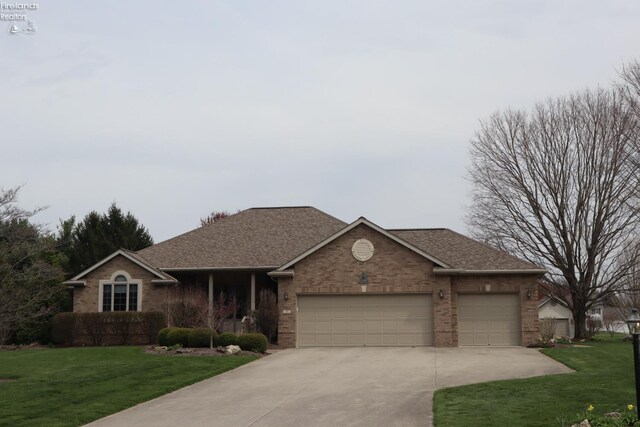 79 Ridgeview Cir, Milan, OH 44846 - single story home featuring a garage, a front yard, driveway, and brick siding