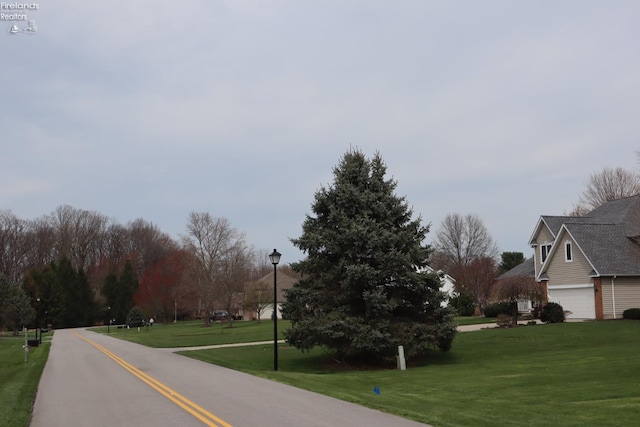 79 Ridgeview Cir, Milan, OH 44846 - view of road with street lighting