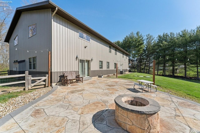 3769 Prospect Rd, New London, OH 44851 - rear view of property with a yard, an outdoor fire pit, fence, and a patio