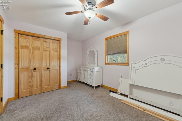 3769 Prospect Rd, New London, OH 44851 - bedroom featuring baseboards, ceiling fan, and light carpet