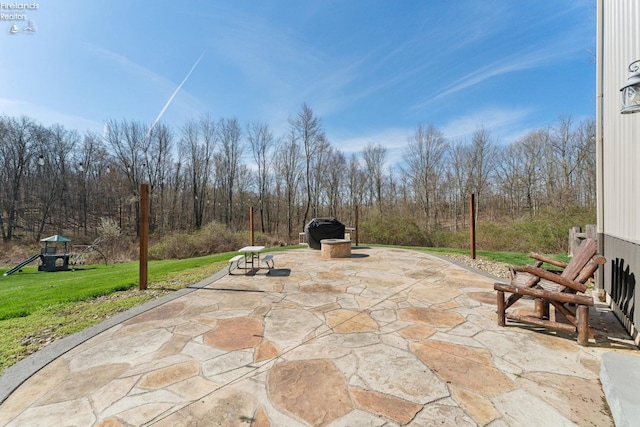 3769 Prospect Rd, New London, OH 44851 - view of patio featuring a playground