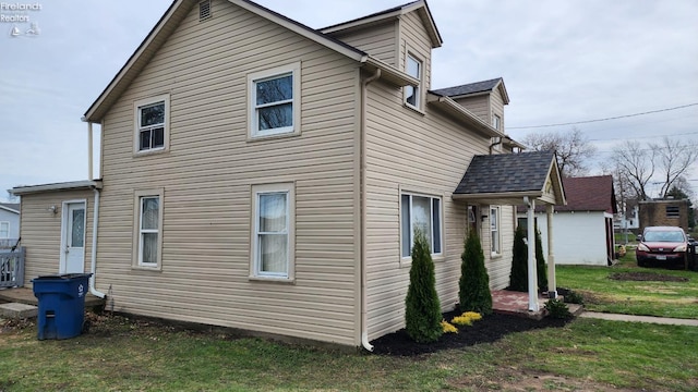 3510 Ohio St, Sandusky, OH 44870 - view of property exterior featuring a yard