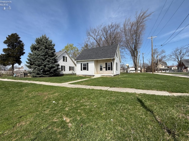 bungalow with a front lawn