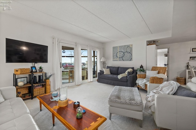 living room featuring light carpet