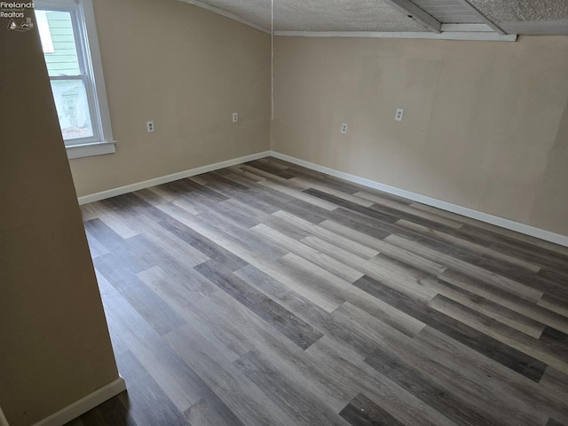 430 Perry St, Sandusky, OH 44870 - unfurnished room with baseboards, wood finished floors, and a textured ceiling