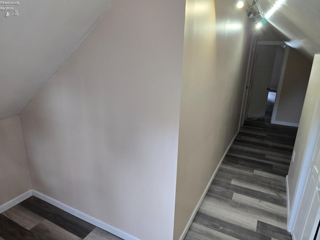 430 Perry St, Sandusky, OH 44870 - hall featuring dark wood-type flooring, baseboards, and vaulted ceiling