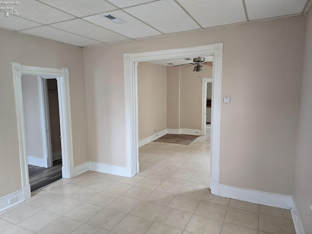 430 Perry St, Sandusky, OH 44870 - unfurnished room featuring a paneled ceiling, baseboards, light tile patterned flooring, and ceiling fan